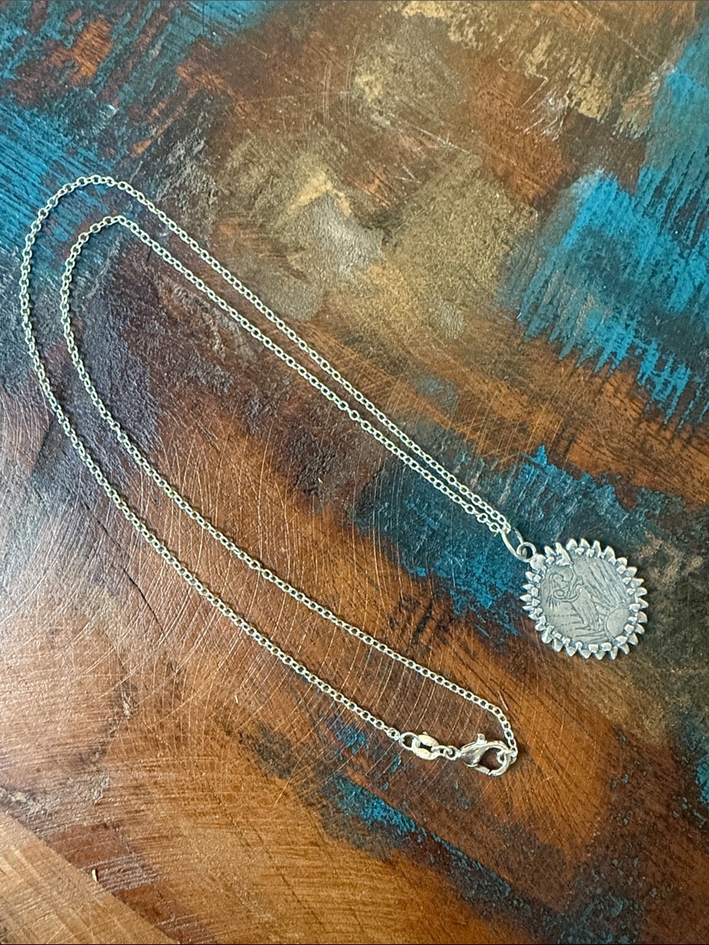 Jes MaHarry ”Mother's Love Forever” silver charm on 20” silver chain.